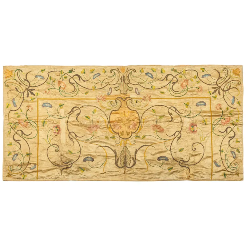 An embroidered altar frontal of ivory satin Italian