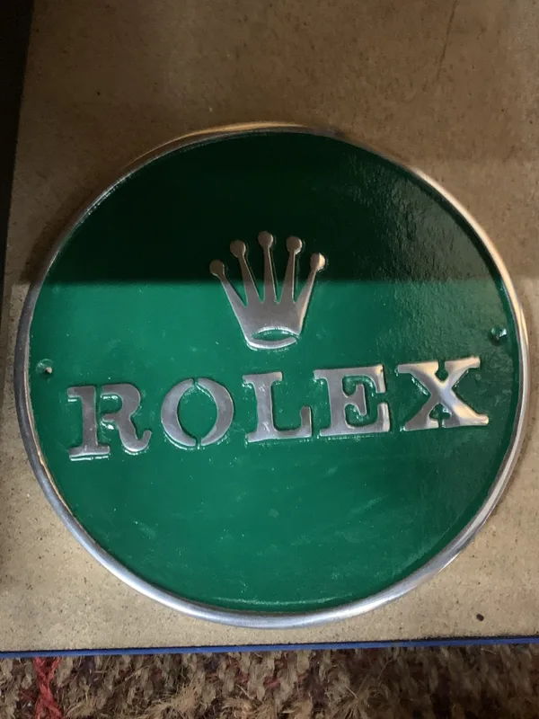 An Alloy Rolex Sign